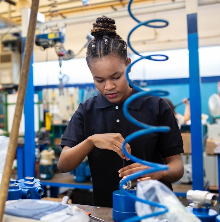 People working in a factory.